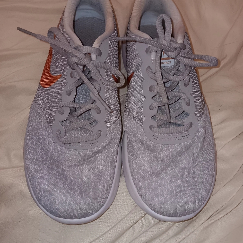 Women's grey white Nike running sneakers size 8.